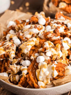 Delicious Air Fryer Sweet Potato Nachos topped with cheese, marshmallows, and yummy goodness.