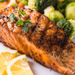 Air Fryer Cedar Plank Salmon --- If you have been looking for an easy for cooking salmon in your air fryer and wondering if you can use a cedar plank in the air fryer, you have come to the right place! Today, we will give you one of the best salmon recipes with a cedar plank!