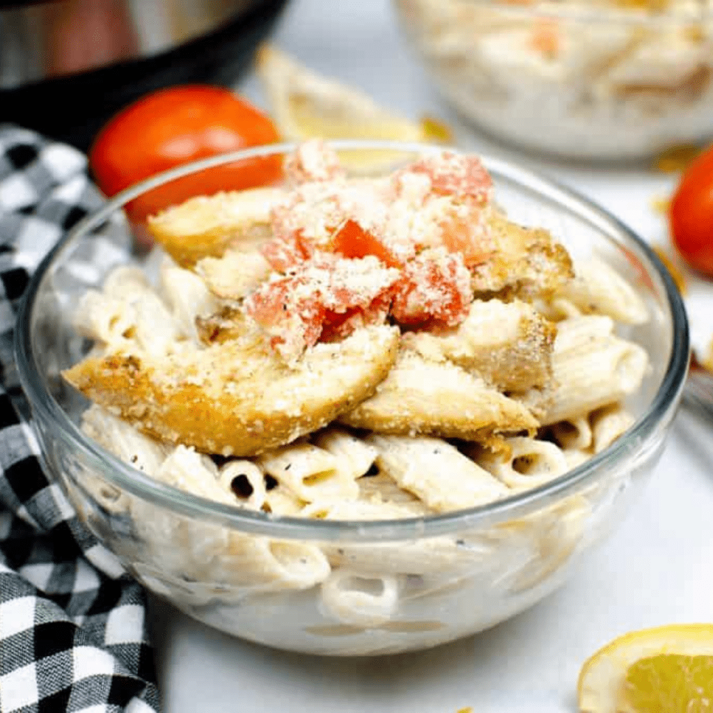 Chili’s Cajun Chicken Pasta is a popular dish millions worldwide have enjoyed. Now, you can easily recreate it at home with this Instant Pot Copycat Chili's recipe! This creamy, cheesy, spicy, and delicious dish will quickly become one of your family's favorite dinner recipes. The combination of chicken breast chunks in a zesty Cajun sauce served over penne pasta creates an irresistible meal packed full of flavor that won't take hours to make. Best of all, this copycat version comes together in just 30 minutes using your Instant Pot - so you can have restaurant-quality meals right from the comfort of your own kitchen any night of the week!



​What Is Chili's Cajun Pasta
​

Chili's Cajun Pasta is a popular dish served at the Chili's restaurant chain. It is a pasta dish combining Cajun seasoning with creamy Alfredo sauce, creating a bold and spicy flavor that is rich and satisfying. The dish typically includes penne pasta, sautéed bell peppers and onions, and a creamy sauce made with heavy cream, Parmesan cheese, and Cajun seasoning. Additional ingredients, such as chicken, shrimp, or sausage, may also be added for extra protein and flavor. Chili's Cajun Pasta is a hearty and flavorful dish that has become a fan favorite for those who love bold and spicy flavors.



Why You Will Love Chili's Copycat Recipe For Cajun Pasta
​

There are many reasons why you will love Chili's Copycat Recipe for Cajun Pasta:

Flavorful: This dish is packed with bold and spicy flavors, thanks to the Cajun seasoning and creamy Alfredo sauce.

Easy to make: This recipe is simple and easy to follow, making it a great option for busy weeknights or when you want to prepare a quick and delicious meal.

Customizable: You can adjust the level of spiciness to your liking by adding more or less Cajun seasoning or using a milder seasoning blend.

Versatile: This dish can be served as a main course or as a side dish and pairs well with various proteins, such as chicken, shrimp, or sausage.

Budget-friendly: Making this copycat recipe at home is much more affordable than dining out at a restaurant.

Crowd-pleaser: The bold and flavorful combination of Cajun seasoning and Alfredo sauce will surely be a hit for kids and adults alike.

Overall, Chili's Copycat Recipe for Cajun Pasta is a delicious, easy-to-make, and versatile dish that will surely become a favorite in your household.



Ingredients Needed For Instant Pot Copycat Chili's Cajun Chicken Pasta
​

Are you a fan of Chili's Cajun Chicken pasta? Do you want to try making this delicious dish at home but feel intimidated by all the cooking steps? We've got great news - it's much simpler than you think with an Instant Pot. In just one pot, you can have a flavorful and hearty meal that tastes like it came from your favorite restaurant. Keep reading for an easy guide on making copycat Chili's Cajun Chicken pasta with detailed instructions on the ingredients needed for success. With this recipe, in no time at all, you will be feasting on creamy and decadent flavors reminiscent of your favorite restaurant dish!

​

Remember the step-by-step directions are below in the printable recipe card at the bottom of the page, as well as the nutritional information.

​

Pasta: Use penne pasta, ziti, bowtie pasta, or rigatoni, any short pasta will work.

Chicken: Use boneless, skinless chicken breast, or chicken tenders

Butter: Use unsalted butter for the best flavor

Half and Half: You can also use almond milk, coconut milk, or heavy cream

Shredded Cheese: Use Parmesan cheese or Mozzrealal Shredded Cheese

​Seasonings and Spices: Cajun Seasoning, Kosher Salt, Black Pepper, lemon zest, and Garlic Powder

Liquid: Instead of using water, you can use low-sodium chicken broth or chicken stock for added flavor. 

Serving: Serve with sliced green onions or fresh parsley. 

​

How To Cook Chili's Delicious Creamy Cajun Chicken Pasta In Instant Pot
​

If you want to add spicy, flavorful flair to your next meal, try this creamy cajun chicken pasta recipe. Taking inspiration from Chili's Meals, it has a tangy combination of bold flavors that everyone is sure to love! Plus, by using an Instant Pot, you can get the same delicious outcome without waiting for hours in the kitchen. This dish comes together quickly and easily for a nutritious dinner packed with protein and veggies – perfect for those busy weeknights when time is tight, but the flavor still matters!

Step One: Cook Pasta


Place the penne pasta in the Instant Pot and fill it with enough water to cover the noodles.  Close the lid and seal your lid by pushing the valve away from you. Set to manual high pressure for 8 minutes. Once your cook time is complete, quick release the valve toward you to open the pressure. Drain your cooked pasta in place in a separate bowl. Set aside.



Step Two: Pressure Cook Cajun Chicken Breast

Season your chicken with the Cajun spices and slice the chicken into strips. Press the saute button on the Instant Pot after you are done cooking your pasta. Add four tablespoons of olive oil. Place your coated chicken into the bottom of the instant pot, and Sauté until the inside of your chicken reaches 165 degrees F by using a meat thermometer. 



Step Three: Prepare The Sauce 



Continue to keep your Instant Pot in saute function. Add in your butter, half-and-half, lemon zest, pepper, salt, and garlic powder to your Instant Pot. Continue to stir until it starts to bubble. 

Return your past to the bowl, mixing well.

​

​Step Four: Serving



Transfer your pasta to your serving dish. Top with a few strips of chicken, extra cajun seasoning, black beans, diced tomatoes, and as much Parmesan cheese as you want! 



Pro Tips For The Best Chili's Cajun Chicken Pasta Recipe
​

Here are some pro tips to help you make the best Chili's Cajun Chicken Pasta Recipe:

Use high-quality ingredients: Use high-quality pasta, fresh bell peppers and onions, and fresh chicken breasts to enhance the flavor and texture of the dish.

Cook the pasta al dente: Cook the pasta until it is al dente, which means it should be cooked but still firm to the bite. This will prevent the pasta from becoming mushy and will ensure that it holds its shape and texture.

Season the chicken with homemade Cajun seasoning, salt, and pepper before cooking to add flavor and ensure it is well seasoned.

Don't overcook the chicken: Cook the chicken until it is just cooked through, being careful not to overcook it. Overcooked chicken can become tough and dry.

Use a mixture of heavy cream and milk: Use a mixture of heavy cream and milk in the Alfredo sauce to create a creamy and rich sauce without making it too heavy or thick.

Add Cajun seasoning to taste: Add Cajun seasoning to taste, adjusting the amount depending on how spicy you like your food. Add additional cayenne pepper or lemon pepper if you want some added spice. 

By following these pro tips, you can make the flavorful, creamy, and satisfying Chili's Cajun Chicken Pasta Recipe. Enjoy your delicious and spicy pasta dish!

​

Frequently Asked Questions
​

Can I use a different type of pasta? Yes, you can use a different type of pasta, such as penne, fusilli, or rotini. This is one of the easiest pasta dishes you can make in the Instant Pot. 

Can I use frozen chicken breasts? Yes, you can use frozen chicken breasts in this recipe. Increase the cooking time to 10 minutes on high pressure for frozen chicken.

Can I make the dish ahead of time?  Yes, you can make the dish ahead of time and store it in the fridge for up to 3 days. Reheat the pasta in the microwave or on the stove before serving.

Can I add vegetables to the dish? Yes, you can add vegetables such as bell peppers, onions, or mushrooms to the dish. Simply sauté the vegetables before adding them to the Instant Pot.

Can I use a different type of cheese? Yes, you can use a different type of cheese, such as Parmesan or Romano. Just be sure to use hard, grated cheese that will melt well.

Can I use a different type of protein? Yes, you can use a different type of protein, such as shrimp, sausage, or tofu. Just be sure to adjust the cooking time accordingly.

Can I make the dish less spicy?  Yes, you can make the dish less spicy using less Cajun seasoning or a milder seasoning blend.



More Instant Pot Recipes