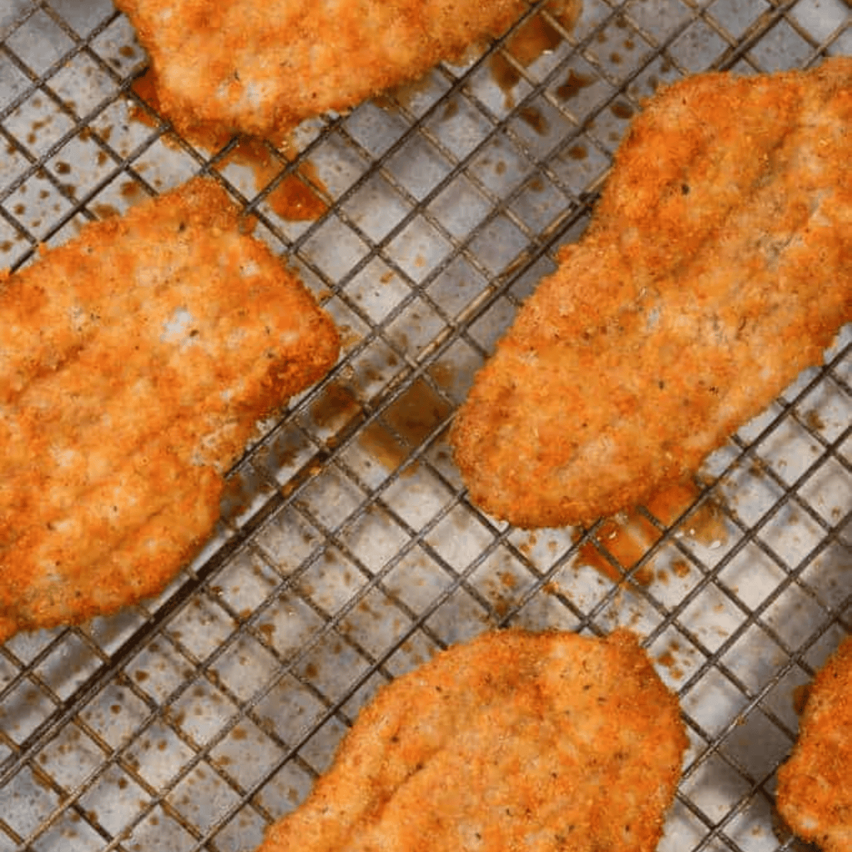 Keto Shake and Bake: Crispy, low-carb chicken coated in a flavorful homemade shake-and-bake mix with pork rind panko and almond flour.