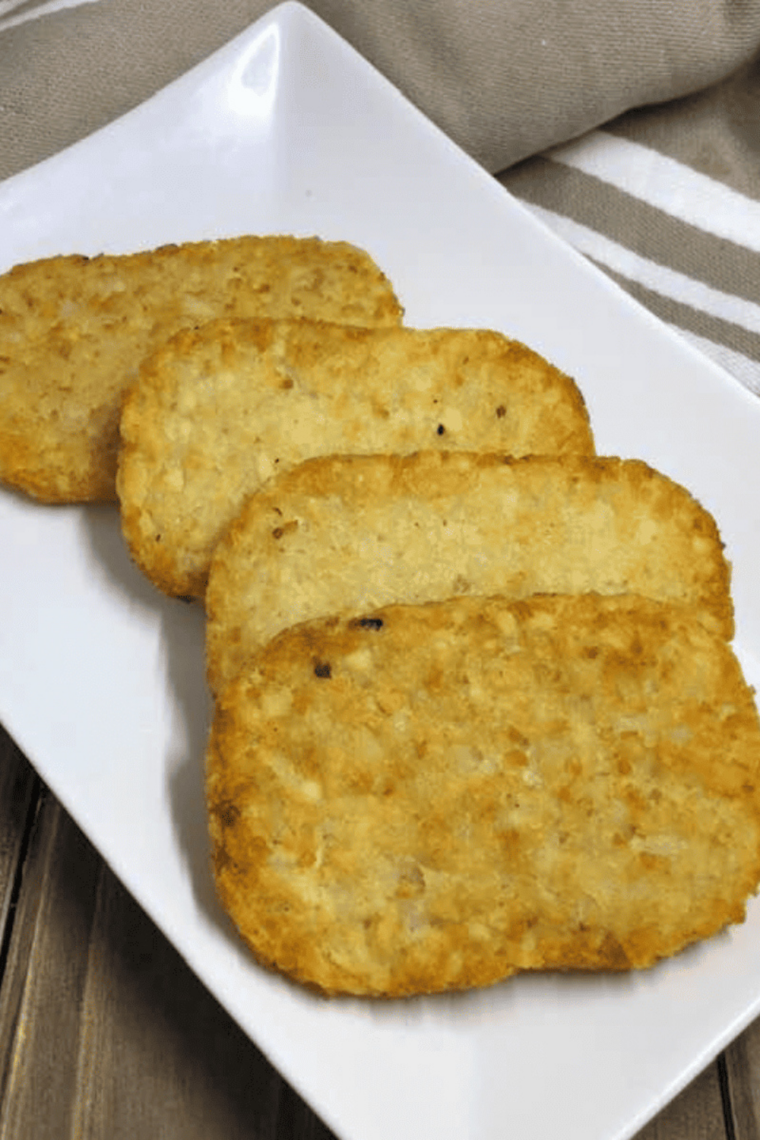Frozen Trader Joe&rsquo;s hash browns air fried until crisp and golden brown with fluffy center for quick McDonald&rsquo;s-style breakfast