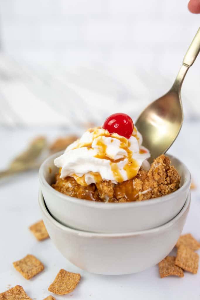 While the classic Air-Fried Fried Ice Cream is a delicious treat, you can explore various recipe variations to customize the flavors and textures. Here are some creative ways to make your air-fried fried ice cream even more exciting:

Flavorful Ice Cream: Start with different ice cream flavors like chocolate ice cream, strawberry, or mint chocolate chip for a unique twist.

Cereal Coatings: Instead of cornflakes, use other cereals like Frosted Flakes, Rice Krispies, or Cinnamon Toast Crunch for added flavor and texture.

Spice Up the Coating: Add a pinch of cayenne pepper or a dash of your favorite spices to the cornflake mixture for a sweet and spicy kick.

Nutty Crunch: Mix finely chopped nuts like almonds, pecans, or peanuts into the coating mixture for a nutty crunch.

Cookie Crust: Crushed cookies like graham crackers, Oreos, or chocolate chip cookies can be used instead of cornflakes for a cookie crust.

Fruit-Filled: Before coating, place a small spoonful of fruit preserves or fruit compote in the center of the ice cream scoop. Then, proceed with the coating and air frying.

Churro-Style: Create a cinnamon-sugar coating by rolling the ice cream balls in a mixture of cinnamon and sugar before air frying.

Deep-Fry Option: If you have a deep fryer, deep fry the coated ice cream balls for a more traditional fried ice cream experience.

Sauce Drizzles: Drizzle your air-fried fried ice cream with sauces like chocolate sauce, hot fudge sauce, butterscotch, raspberry coulis, or honey for added flavor and visual appeal.

Tropical Twist: Roll the ice cream balls in shredded coconut flakes before coating them with the cereal mixture for a tropical flair.

Sundae Style: Serve your air-fried fried ice cream as a sundae with a scoop of vanilla ice cream, whipped cream, chopped nuts, and maraschino cherries on top.

Gluten-Free Option: Use gluten-free cereal and ensure all other gluten-free ingredients for a gluten-free version.



These variations offer exciting ways to personalize your air-fried fried ice cream, making it a dessert that suits your tastes and creativity. Mix and match flavors and textures to create the perfect dessert for any occasion.