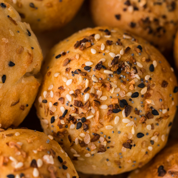 Easy air fryer bagel bites made with just Greek yogurt and self-rising flour, golden brown and dusted with everything bagel seasoning.