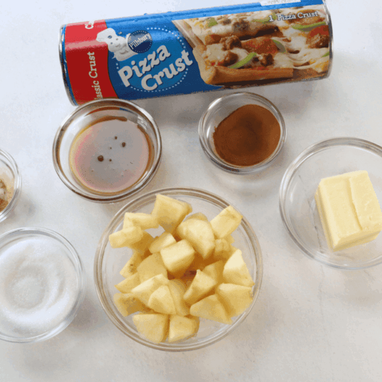 Ingredients needed for Air Fryer Caramel Stuffed Donuts on kitchen table.