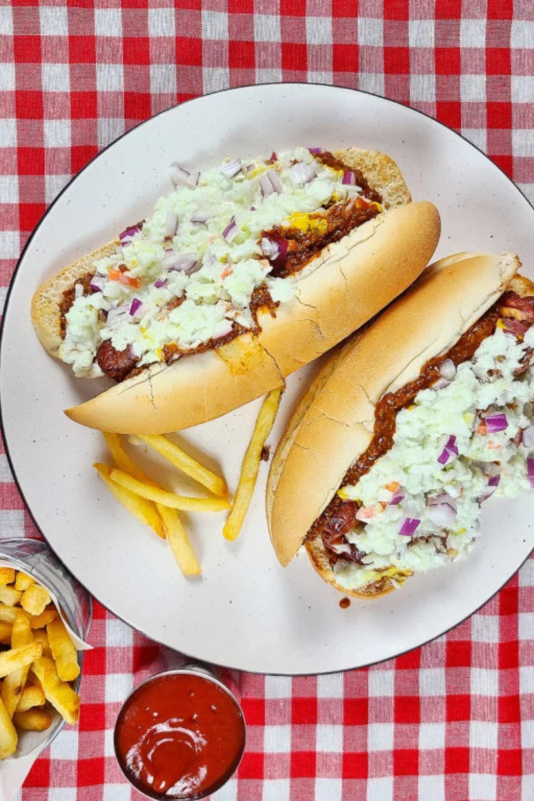 Air Fryer Carolina-Style Hot Dogs served at a barbecue: "Air Fryer Carolina-Style Hot Dogs served at a summer barbecue."