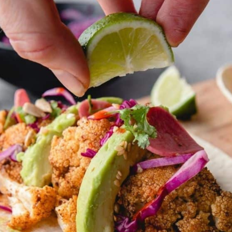 Colorful Air Fryer cauliflower tacos with vibrant toppings and fresh ingredients