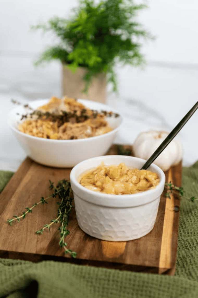 Air Fryer Garlic Confit with golden roasted garlic cloves submerged in olive oil