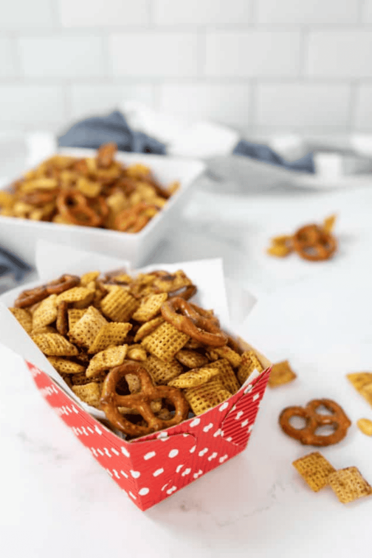 Blackstone Chex Mix with crunchy Chex cereal, pretzels, nuts, and savory seasoning.