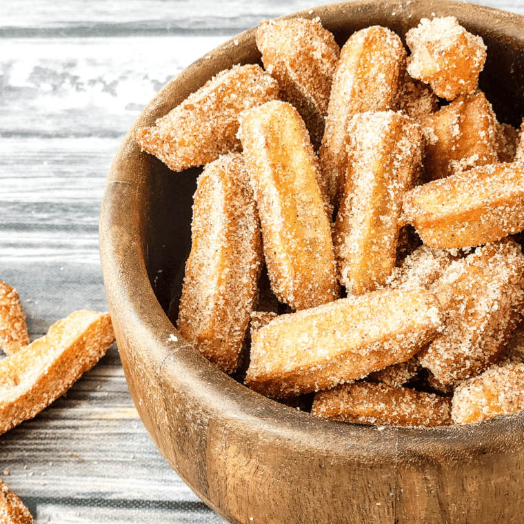 Delicious homemade churros, golden and crispy on the outside, soft on the inside, inspired by Disney's classic churros recipe.