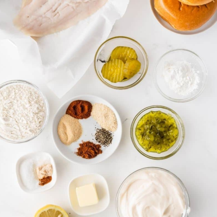 Ingredients needed for Popeyes Fish Sandwich Copycat Recipe on kitchen table.