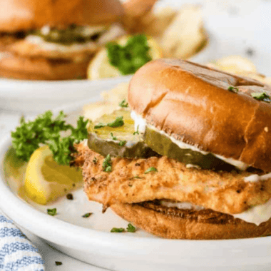 Recreate the delicious Popeyes Fish Sandwich at home with this easy copycat recipe. Crispy fish, a soft bun, and tangy sauce make this sandwich a perfect meal for any occasion.