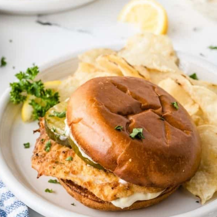 Popeyes Fish Sandwich Copycat with crispy fish fillets, soft bun, and tangy sauce.