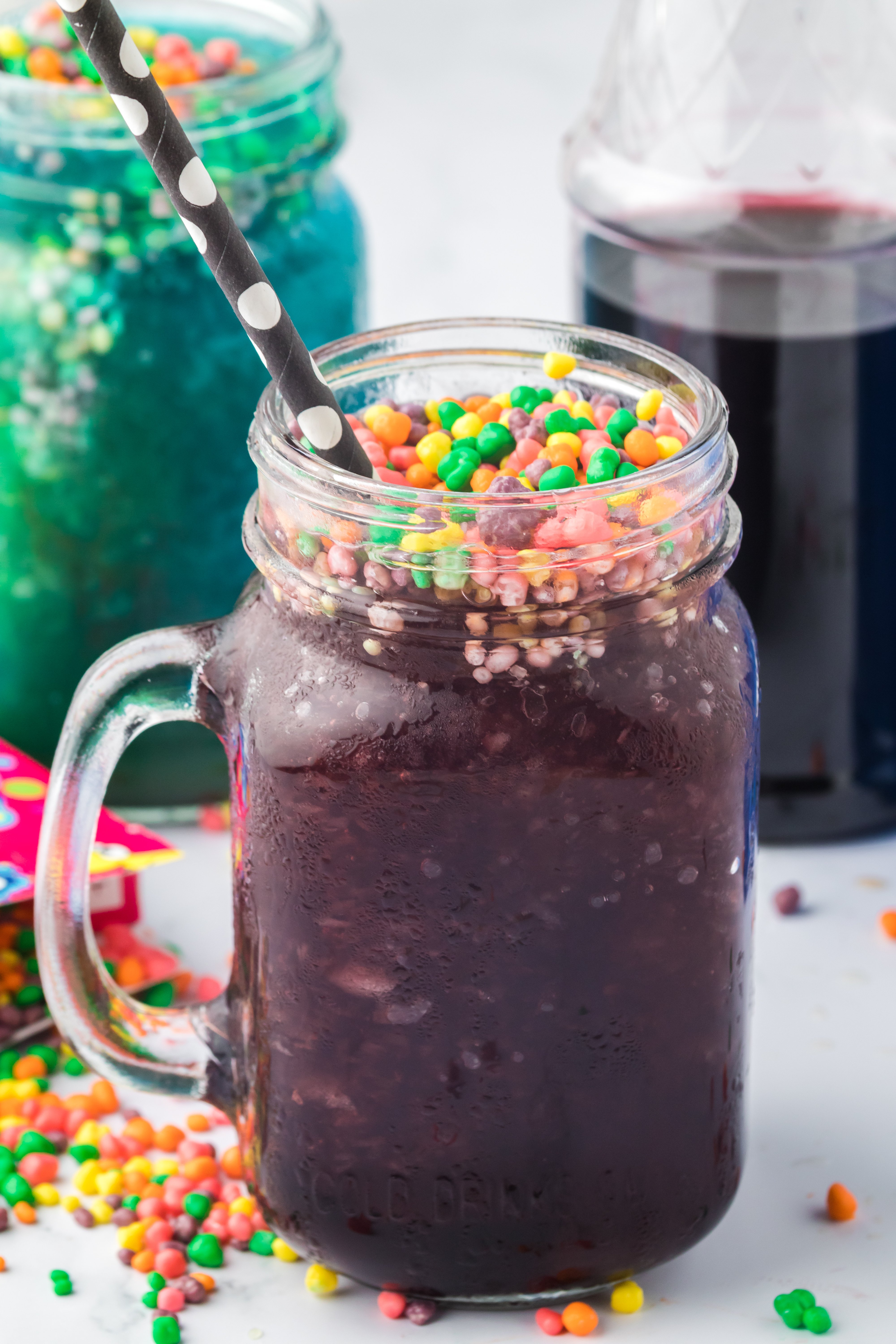 Pour the Slushie into a glass, and garnish with Nerds.
