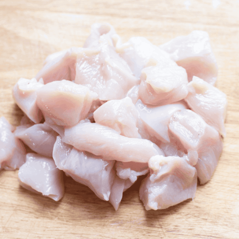 Dice chicken into bite sized pieces.