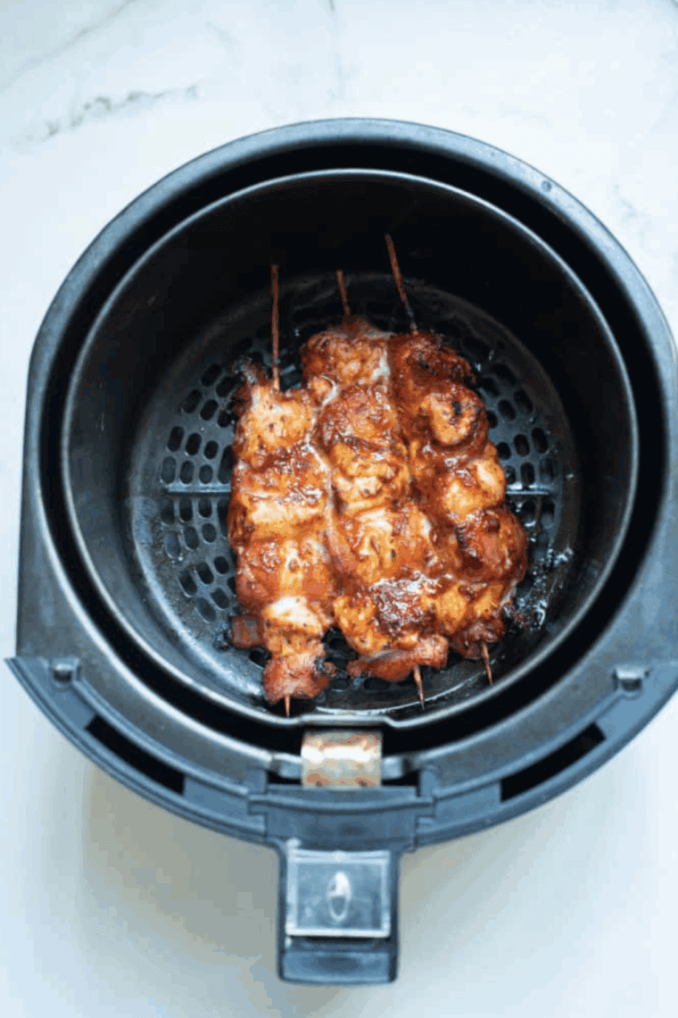 Place Chicken Thigh Bites into the air fryer basket.