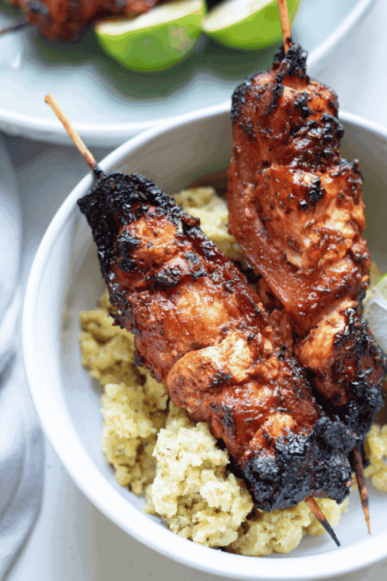 Crispy and juicy Air Fryer Chicken Thigh Bites, golden brown and served with a dipping sauce.