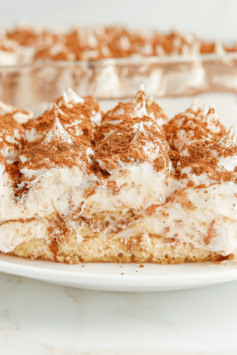 Golden, crisp homemade ladyfingers cooling on parchment paper straight from the air fryer.