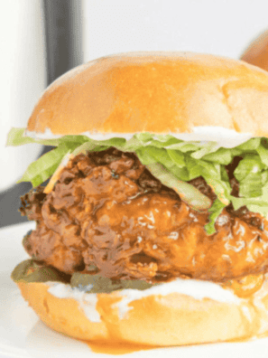 Savor the perfect blend of sweet and spicy with this Air Fryer Hot Honey Chicken Sandwich! Crispy, juicy chicken topped with a drizzle of hot honey, served on a toasted bun for a mouthwatering meal that's quick and easy to make.