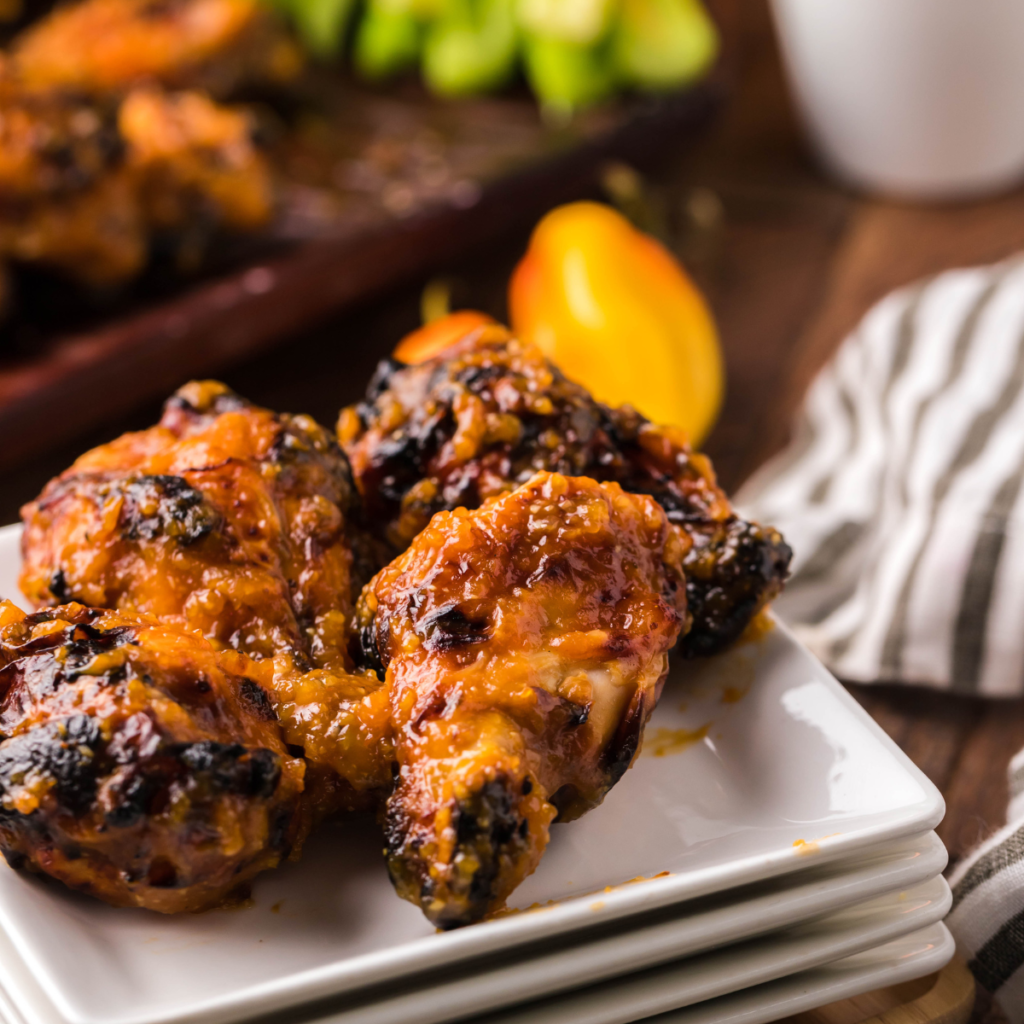 Air Fryer Spicy Apricot Glazed Wings --Are you craving the perfect snack to hit that sweet and spicy spot? Look no further than these Air Fryer Apricot Glazed Wings! Incredibly easy to make in just a few steps, you'll be tempted to try them repeatedly. 