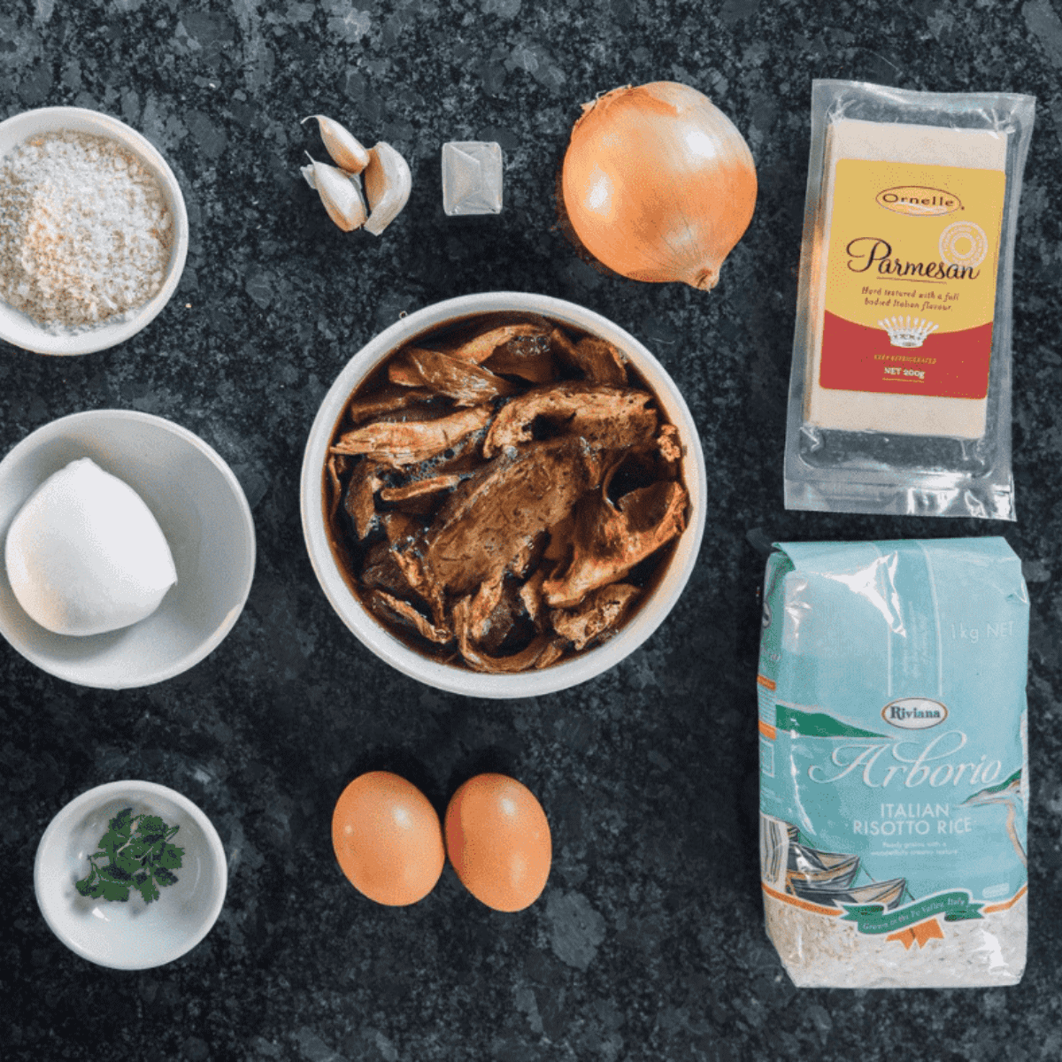 Ingredients needed for Carrabba's Italian Grill Arancini Recipe on kitchen table.