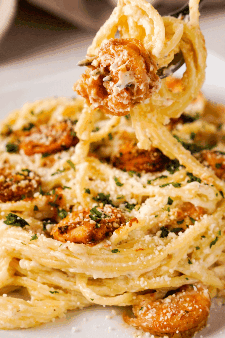 Cheesecake Factory Copycat New Orleans Cajun Shrimp with perfectly seasoned shrimp garnished with fresh herbs.