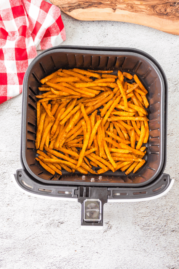 Air Fryer Basket of Copycat Hardee's Seasoned Fries.