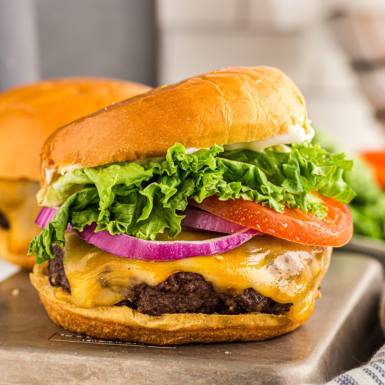 Delicious homemade Copycat Wendy’s Dave’s Single burger featuring a juicy beef patty, fresh toppings, and melted cheese on a soft bun, perfect for recreating a fast-food favorite at home.