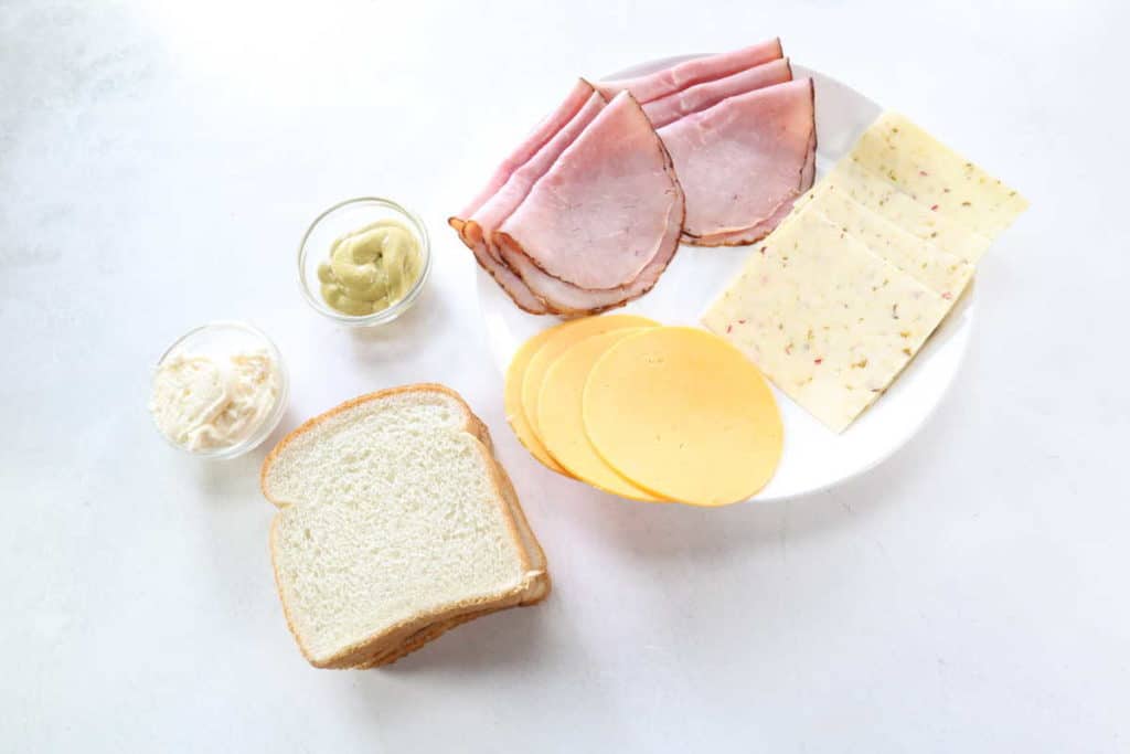 overhead: ingredients needed for a hot ham and cheese sandwich