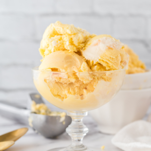 Ninja Creami Peach Ice Cream -- Are you ready to take your summer ice cream treats up a notch? If so, Ninja Creami Peach Ice Cream should be on your list of must-try frozen delights.