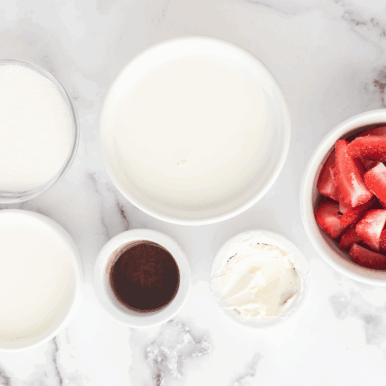 Ninja Creami Strawberry Ice Cream ingredients on kitchen table.