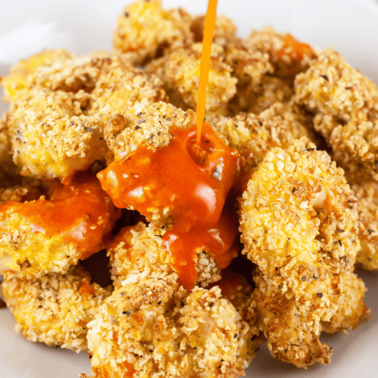 Delicious Panda Express-style crispy shrimp coated in spicy chili crisp sauce.