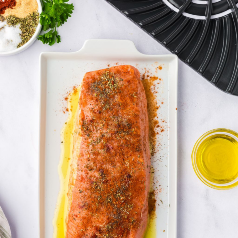 Pork tenderloin brushed with olive oil and seasoned with spices and herbs