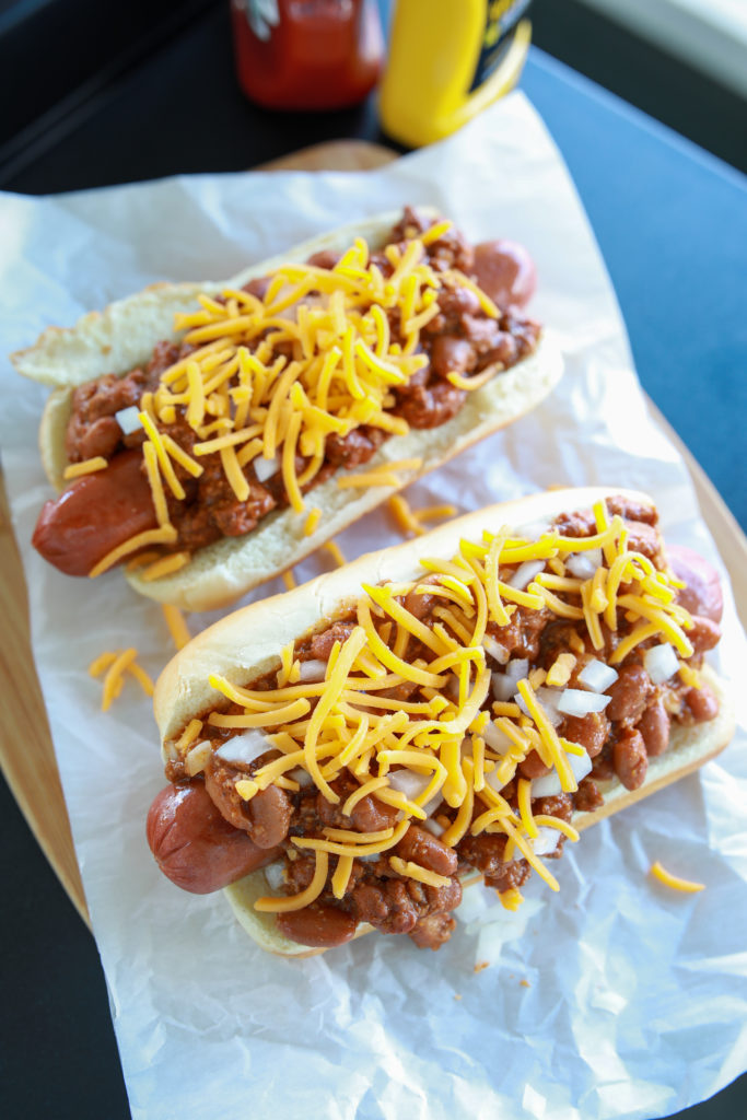 Blackstone Griddle Hot Dogs -- Are you ready to tantalize your taste buds with the most delicious hot dogs around? Get ready for some finger-lickin' goodness when you fire up your Blackstone Griddle and start cooking hot dogs. 