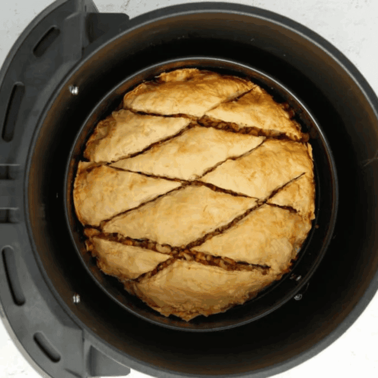 Cooked Baklava in the air fryer basket.