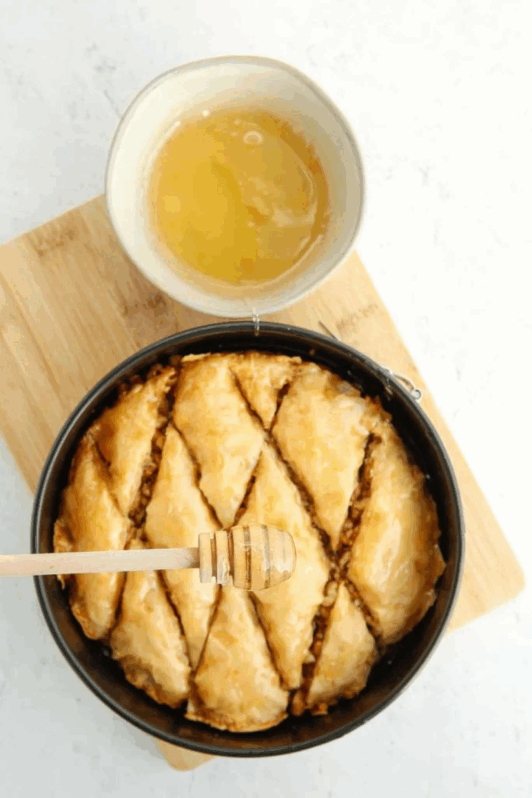 Golden, crispy Air Fryer Baklava squares with honey drizzle and nut filling.