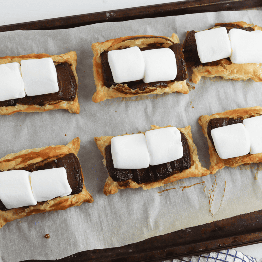 Carefully remove the s'mores bites from the air fryer and let them cool slightly.
