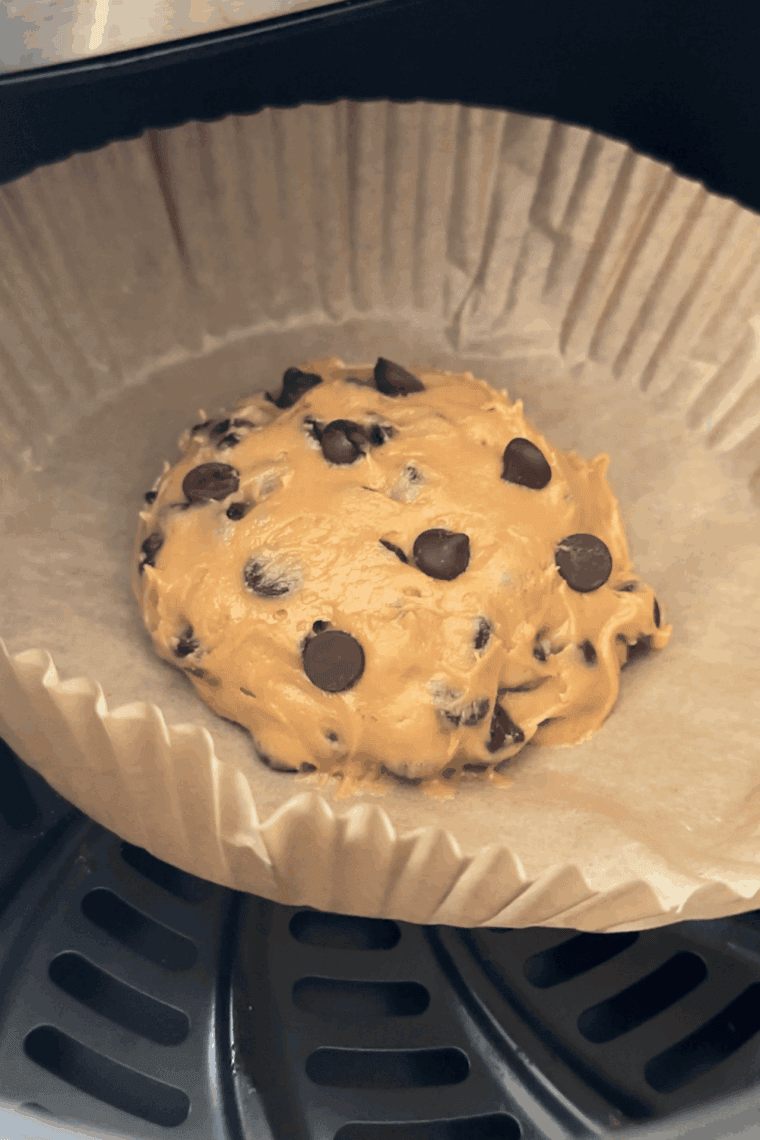 Air fryer single serve chocolate chip cookie baked until soft and gooey