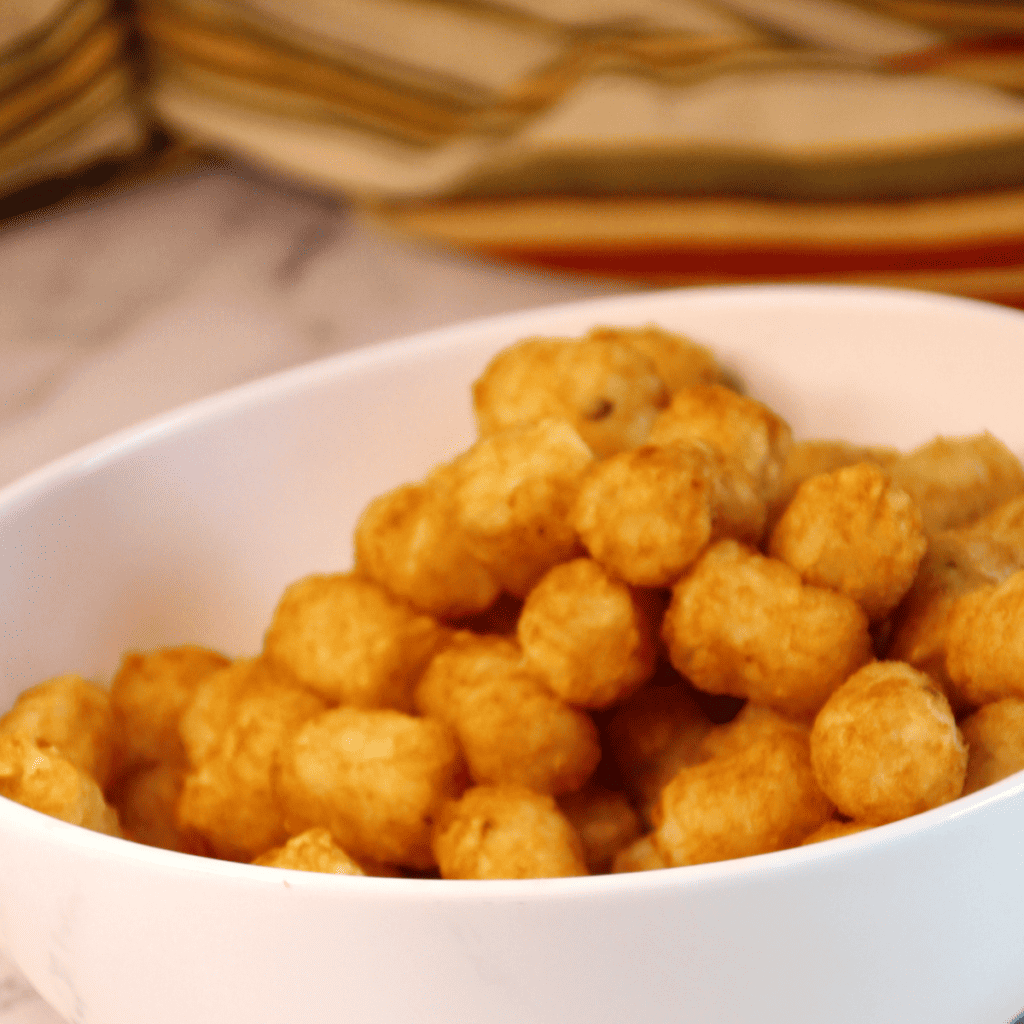 Sonic tater tots are the ultimate comfort food and indulgence. They are crispy, salty, and delicious enough that it’s hard to resist ordering them whenever you stop by a Sonic restaurant. But with an air fryer, you can enjoy homemade sonic tater tots right in your own kitchen! With just a few ingredients and little effort, you'll be able to recreate this fast-food classic without leaving the house. In this blog post, we'll discuss how quick and easy it is to make homemade sonic tater tots in your air fryer - perfect for when those Sonic cravings hit but heading out isn't an option. Read on for all of the tips and tricks needed so that everyone around your dinner table can get their fill of these tasty little morsels.