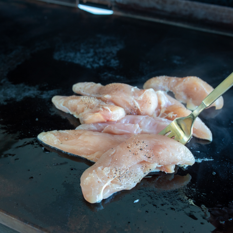 Blackstone griddle preheated to 375&deg;F with a thin shimmering coat of oil on the flat-top surface