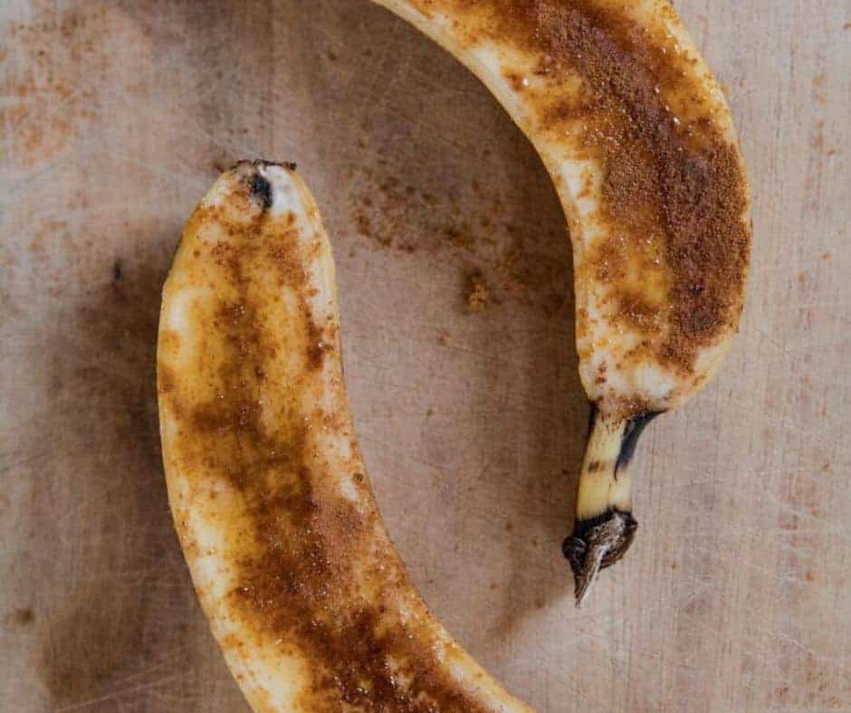 overhead: sliced bananas with butter, sugar, and cinnamon