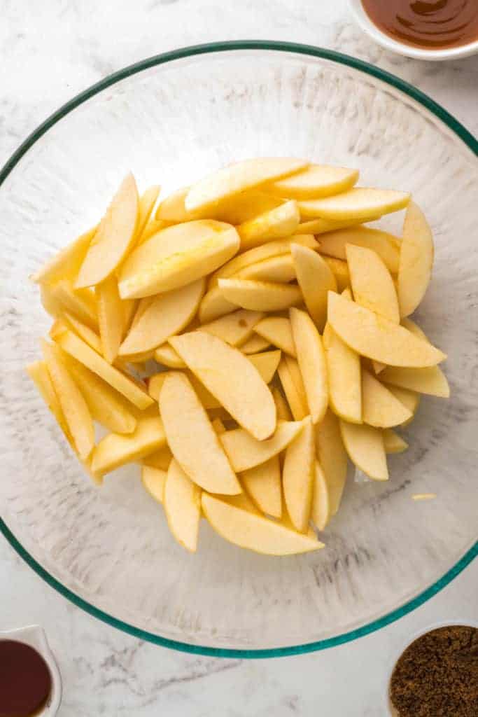 overhead: a bowl of apple slices for fried cinnamon apples