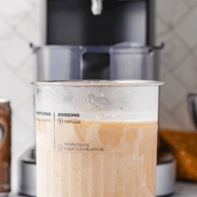 Frozen Ninja Creami Dr. Pepper cream soda served in a pint container with smooth, creamy texture