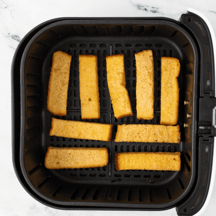 Preheat the Air Fryer: It's a good practice to preheat your air fryer for a couple of minutes, usually at the desired cooking temperature. For French Toast Sticks, around 350°F (175°C) is ideal.

Arrange the Sticks: Place the frozen French Toast Sticks in a single layer in the air fryer basket. Ensure there's some space between each stick for proper air circulation. Depending on the size of your air fryer, you might need to cook them in batches.

Cooking Time: Air fry the sticks for about 8-10 minutes, turning or shaking them halfway through the cooking process to ensure even browning.

Check for Doneness: The sticks should be golden brown and crispy on the outside when done. If they aren't as crispy as you'd like, you can cook them for an additional 1-2 minutes. However, be cautious and frequently check to avoid overcooking or burning.

Serve: Once done, serve the French Toast Sticks immediately with your preferred dipping sauce, syrup, or fruit.