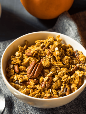 Pumpkin Spice Granola in a white bowl on a table