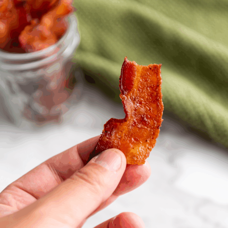 Caramelized, crispy thick-cut Million Dollar Bacon slices coated in brown sugar and butter.