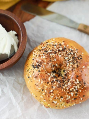 Plate of reheated bagels with a golden-brown, crispy exterior and a warm, soft center