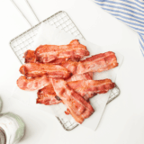 Crispy Bar-S sliced bacon cooked in an air fryer basket, ready to serve.