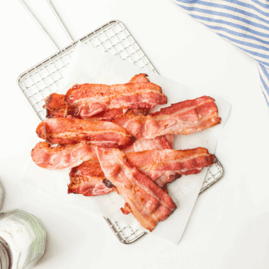 Crispy Bar-S sliced bacon cooked in an air fryer basket, ready to serve.
