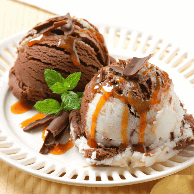 Scoops of creamy chocolate toffee ice cream made in the Ninja Creami, served in a bowl with crunchy toffee bits on top. 🍫🍦