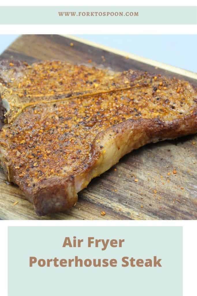 Close up of cooked steak with overlay text reading "air fryer porterhouse steak" 